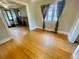 Open living room featuring hardwood floors and natural light at 1881 S Lincoln St, Denver, CO 80210