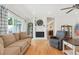 Comfortable living room with hardwood floors and fireplace at 7255 S Vine St, Centennial, CO 80122