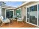 Charming outdoor patio perfect for entertaining with comfortable seating and sliding door access to the home at 7255 S Vine St, Centennial, CO 80122