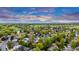 An aerial view of the property showcasing the surrounding landscape with mountain views at 323 S Hoover Ave, Louisville, CO 80027