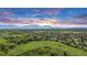 A scenic aerial view of the property showcasing the surrounding landscape with mountain backdrop at 323 S Hoover Ave, Louisville, CO 80027