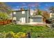 This property features a spacious backyard with a well-maintained lawn and a large deck at 323 S Hoover Ave, Louisville, CO 80027