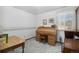 Bedroom featuring an ornate desk, neutral carpet, and bright natural light at 1040 Hemlock Way, Broomfield, CO 80020
