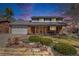 Charming two-story home with lush yard, large garage, and inviting entryway at 1040 Hemlock Way, Broomfield, CO 80020