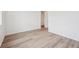 A bright, airy bedroom with beautiful hardwood floors, perfect for creating a relaxing retreat at 24747 E 40Th Ave, Aurora, CO 80019