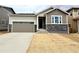Charming single-Gathering home with a two-car garage and stone accents at 24747 E 40Th Ave, Aurora, CO 80019