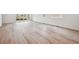 The living room features a seamless hardwood floor at 24747 E 40Th Ave, Aurora, CO 80019