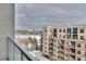 Scenic balcony view overlooking a lake and surrounding cityscape at 4200 W 17Th Ave # 619, Denver, CO 80204