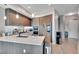 Elegant kitchen with stainless appliances, quartz counters, and designer backsplash at 4200 W 17Th Ave # 619, Denver, CO 80204