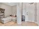 Cozy living area with modern furnishings, light wood floors and exposed concrete pillar at 4200 W 17Th Ave # 619, Denver, CO 80204
