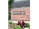 Exterior view of the Denver Botanic Gardens sign, surrounded by lush landscaping at 47 Harrison, Denver, CO 80206
