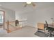 Upstairs landing featuring a small desk, a plant, and a view of the lower level at 31139 Tahoe Ct, Evergreen, CO 80439