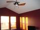 Bedroom featuring natural light from two windows and a ceiling fan at 12317 W Gould Ave, Littleton, CO 80127