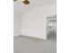 Bright bedroom with a ceiling fan and neutral carpet at 12317 W Gould Ave, Littleton, CO 80127
