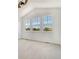 Bedroom featuring three windows with views at 12317 W Gould Ave, Littleton, CO 80127