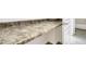 Close-up on stone countertop, perfect for folding laundry or used as a desk at 12317 W Gould Ave, Littleton, CO 80127