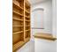 Charming office nook with custom wooden bookshelves and alcove for displays or storage solutions at 12317 W Gould Ave, Littleton, CO 80127