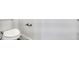 Powder room featuring a toilet and modern fixtures at 12317 W Gould Ave, Littleton, CO 80127