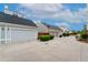Detached garages with ample parking space, adding convenience and value to the property at 8851 E 33Rd Ave, Denver, CO 80238