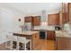 Beautiful kitchen with stainless steel appliances and granite island at 8851 E 33Rd Ave, Denver, CO 80238