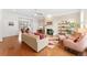 Spacious living room with fireplace and hardwood floors at 8851 E 33Rd Ave, Denver, CO 80238