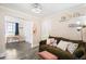 Bright living room with warm colors and access to bedroom and other rooms at 1024 E 14Th Ave # 9, Denver, CO 80218