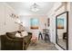 Inviting living room with modern lighting and light walls, a cozy couch, and stylish accents at 1024 E 14Th Ave # 9, Denver, CO 80218