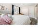 Spacious bedroom with large windows, a closet, and hardwood flooring at 1024 E 14Th Ave # 9, Denver, CO 80218