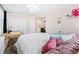 Cozy bedroom setup with an entrance to the living room and modern closet at 1024 E 14Th Ave # 9, Denver, CO 80218