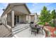 Spacious backyard with patio perfect for outdoor dining and entertaining at 9157 Rio Lado St, Littleton, CO 80125
