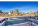 Cozy outdoor balcony features a patio set with scenic views at 11803 W Stanford Dr, Morrison, CO 80465