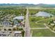 An aerial view of an apartment complex, with lakes and roads running either side at 8100 W Quincy Ave # A8, Littleton, CO 80123