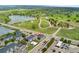 Aerial view of building with lake and golf course in the background at 8100 W Quincy Ave # A8, Littleton, CO 80123
