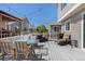 Spacious deck with outdoor seating, dining area, and a grill, perfect for enjoying the outdoors and neighborhood views at 15446 Coopers Hawk Way, Parker, CO 80134