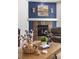Living room with a cozy fireplace and stylish decor at 15446 Coopers Hawk Way, Parker, CO 80134
