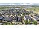 Breathtaking aerial shot of a Primary-planned community next to beautiful lakes and open spaces at 4565 Colorado River Dr, Firestone, CO 80504