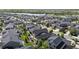Scenic aerial perspective of a suburban community near a lake and open spaces at 4565 Colorado River Dr, Firestone, CO 80504