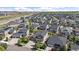Expansive aerial view of a neighborhood showcasing modern homes and community layout at 4565 Colorado River Dr, Firestone, CO 80504