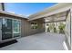 View from the backyard shows back porch leading into the house at 4565 Colorado River Dr, Firestone, CO 80504