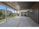 Covered porch with ample space for outdoor seating and entertaining in any weather at 4565 Colorado River Dr, Firestone, CO 80504