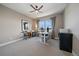 Home office/bedroom with ceiling fan, large window and desk at 4565 Colorado River Dr, Firestone, CO 80504