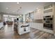 The modern kitchen with stainless steel appliances and ample counter space at 4565 Colorado River Dr, Firestone, CO 80504