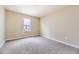 Neutral carpeted bedroom providing ample natural light and space with an adaptable design ready to personalize at 4807 River Highlands Loop, Elizabeth, CO 80107
