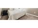 Cozy bedroom featuring a comfortable bed with decorative pillows and a dark wood nightstand at 4807 River Highlands Loop, Elizabeth, CO 80107