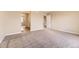 Expansive carpeted bedroom, featuring neutral walls and natural light; a serene space for rest and relaxation at 4807 River Highlands Loop, Elizabeth, CO 80107