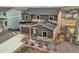 Charming two-story home featuring a stone-accented front, a well-maintained lawn, and an attached garage at 4807 River Highlands Loop, Elizabeth, CO 80107