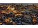 Cityscape aerial view at night featuring illuminated buildings, busy roadways, and residential neighborhoods at 1805 W 34Th Ave, Denver, CO 80211