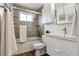 Cozy bathroom featuring a shower-tub combination and single sink vanity at 12235 Garfield Pl, Thornton, CO 80241