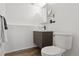 Bathroom with modern sink, vanity and toilet at 12235 Garfield Pl, Thornton, CO 80241