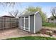 Well-maintained outdoor storage shed with double doors, providing ample space for storing equipment and tools at 12235 Garfield Pl, Thornton, CO 80241